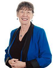 Dr Marcia Turner Picture of woman in blue blazer in black shirt